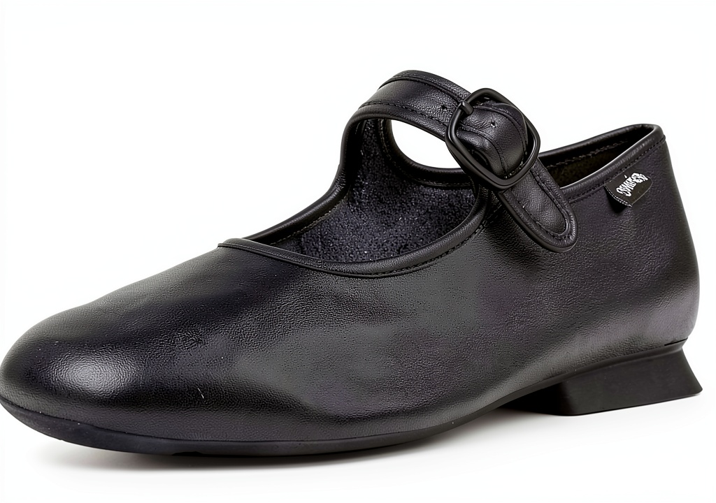 Installing Womens Leather Flats Black Comfortable Casual Shoes on a wooden desk