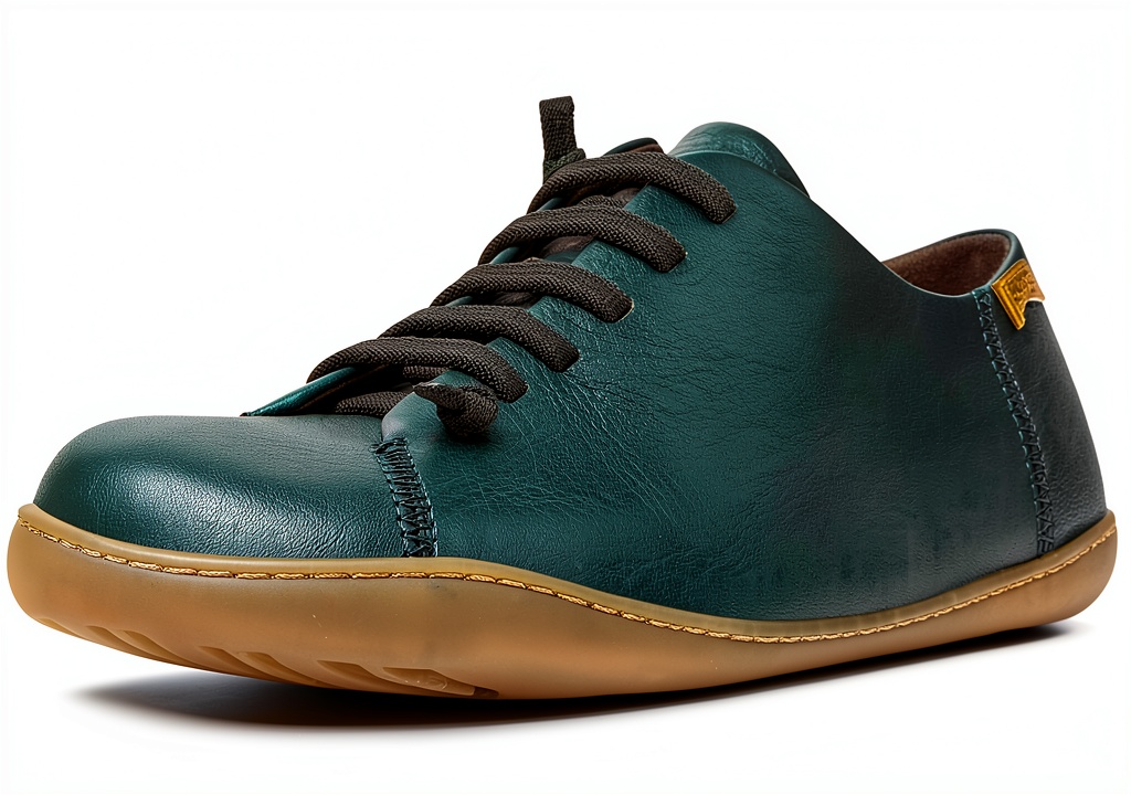 Camper mens leather sneakers in dark green on a neutral background